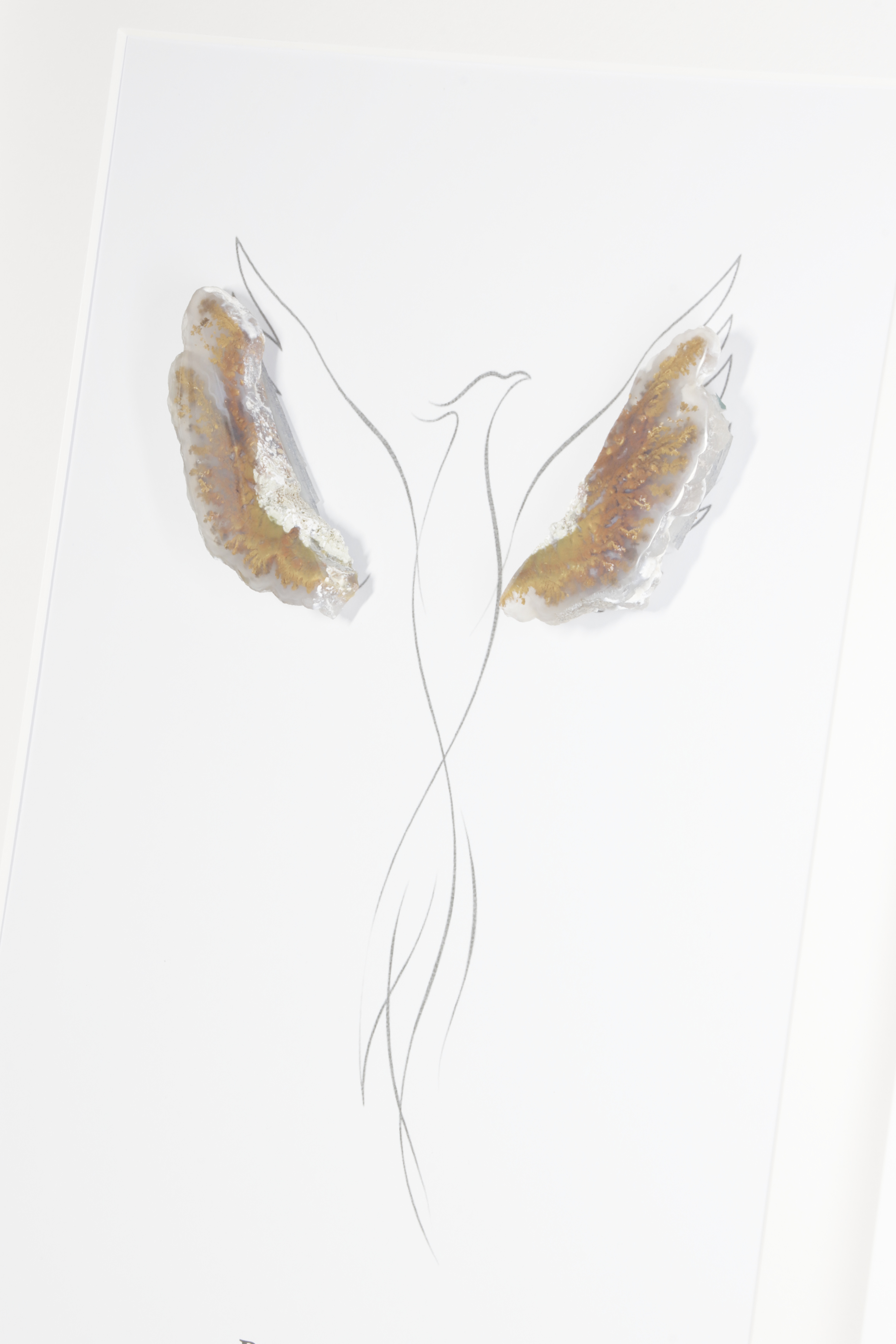 Phönix Achat framed artwork displayed on a dark gallery wall